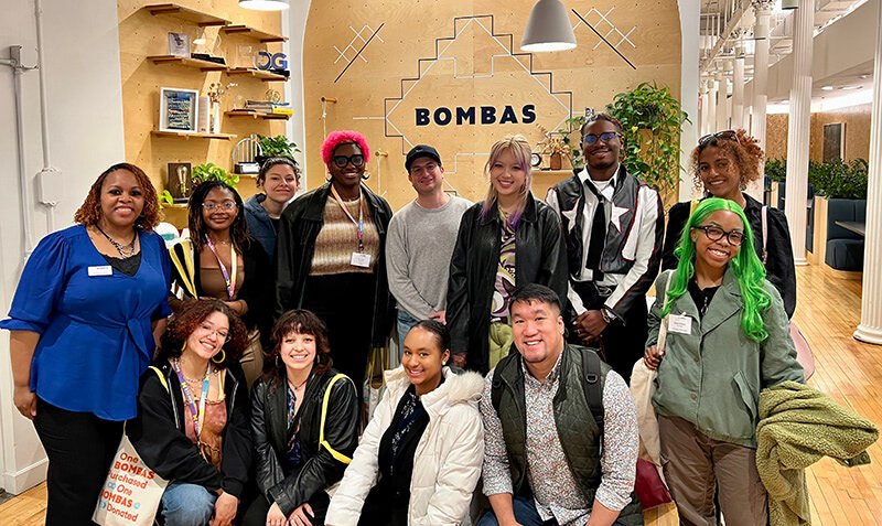 Students pose for a group portrait at Bombas